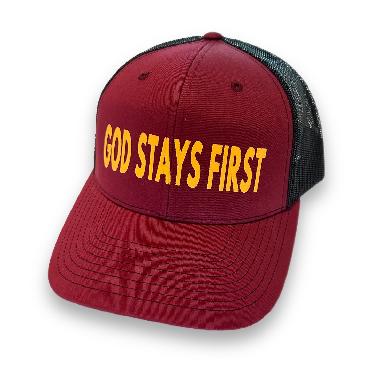 God Stays First Trucker Hat